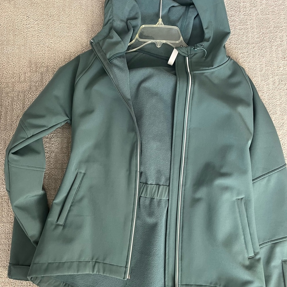 Fabletics hooded coat. Rain repellent, light fleece lining. Small, hip length.